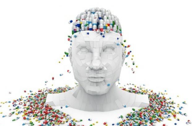 Symbolbild Gehirndoping: Plastik eines Kopfes, anstatt des Gehirns sind viele Pillen im Kopf zu sehen.