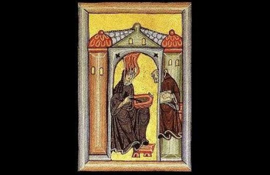 Eine Miniatur zeigt Hildegard von Bingen beim Herstellen von Medizin.